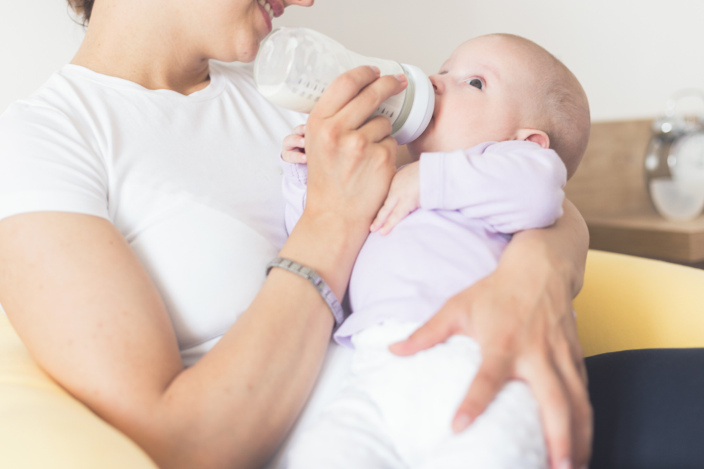 Baby Drinking Milk From Bottle